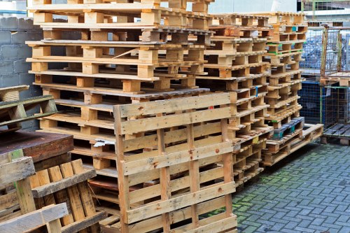 Man and van loading household rubbish in Plumstead